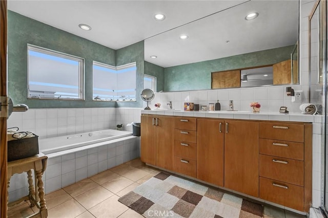 16745 Bayview Dr Unit B, Sunset Beach, CA 90742 - bathroom featuring double vanity, a whirlpool tub, recessed lighting, and tile patterned flooring