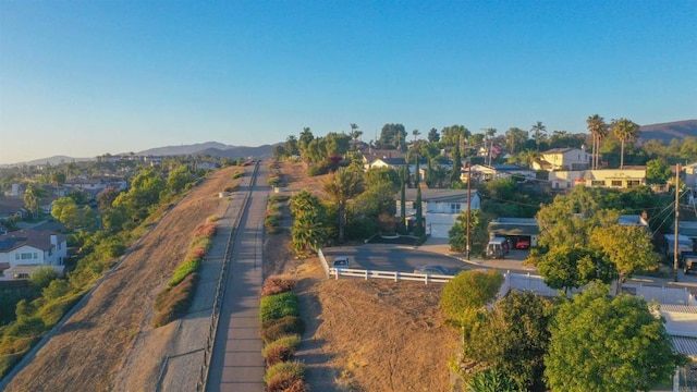 1682 Saddlehorn Dr, San Marcos, CA 92069 - aerial view of property and surrounding area featuring nearby suburban area and a mountainous background