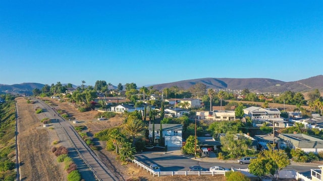 1682 Saddlehorn Dr, San Marcos, CA 92069 - aerial perspective of suburban area with a mountainous background