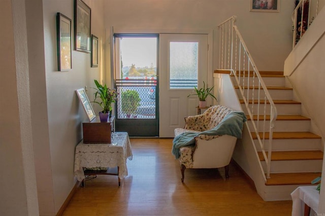 1682 Saddlehorn Dr, San Marcos, CA 92069 - entryway with wood finished floors and stairway