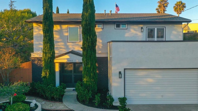 1682 Saddlehorn Dr, San Marcos, CA 92069 - view of front facade featuring stucco siding and a garage