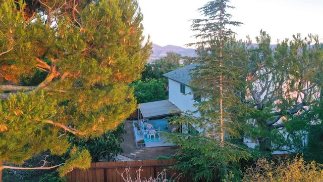 1682 Saddlehorn Dr, San Marcos, CA 92069 - view of side of home featuring a patio area and a mountain view