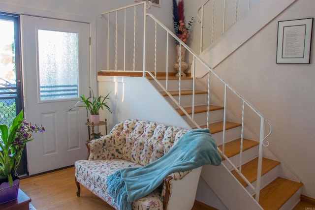 1682 Saddlehorn Dr, San Marcos, CA 92069 - stairs featuring plenty of natural light and wood finished floors