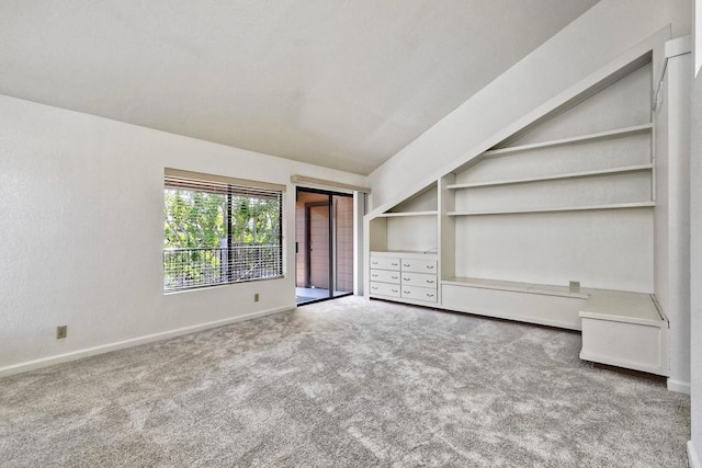 4015 Canario St Unit E, Carlsbad, CA 92008 - unfurnished bedroom featuring carpet and lofted ceiling