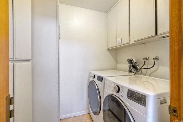 4015 Canario St Unit E, Carlsbad, CA 92008 - laundry area featuring cabinet space and independent washer and dryer