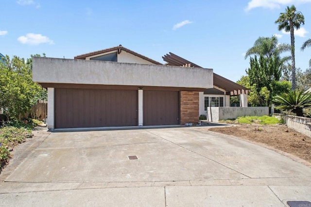 6174 Syracuse Way, San Diego, CA 92122 - contemporary home with a garage, driveway, and stucco siding