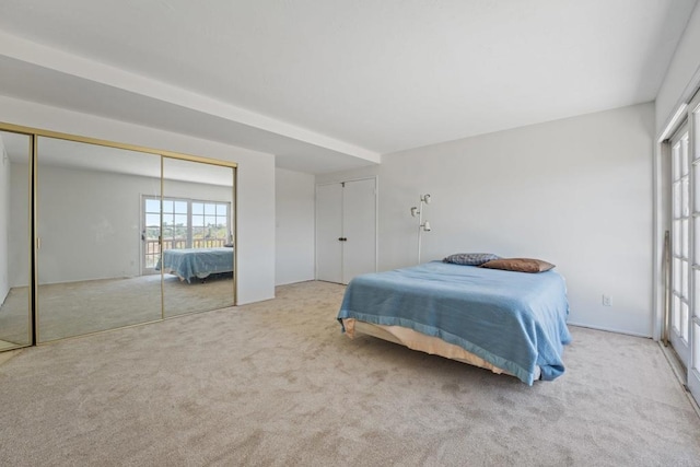 6174 Syracuse Way, San Diego, CA 92122 - bedroom featuring carpet floors and two closets