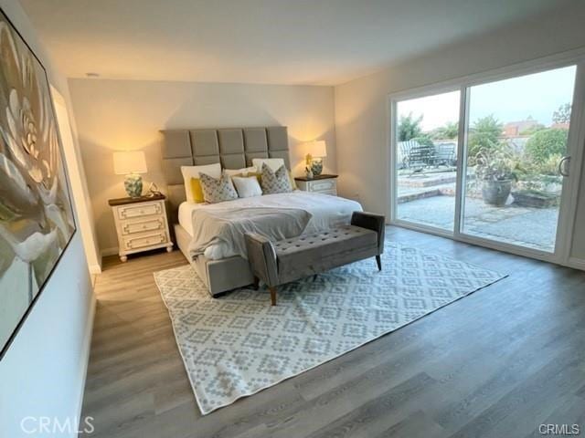 16413 Abascal Dr, Hacienda Heights, CA 91745 - bedroom featuring access to exterior and wood finished floors