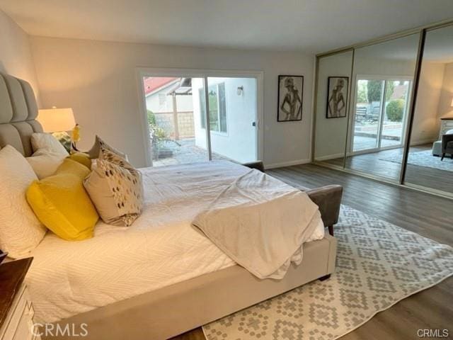 16413 Abascal Dr, Hacienda Heights, CA 91745 - bedroom featuring access to outside, multiple windows, and wood finished floors