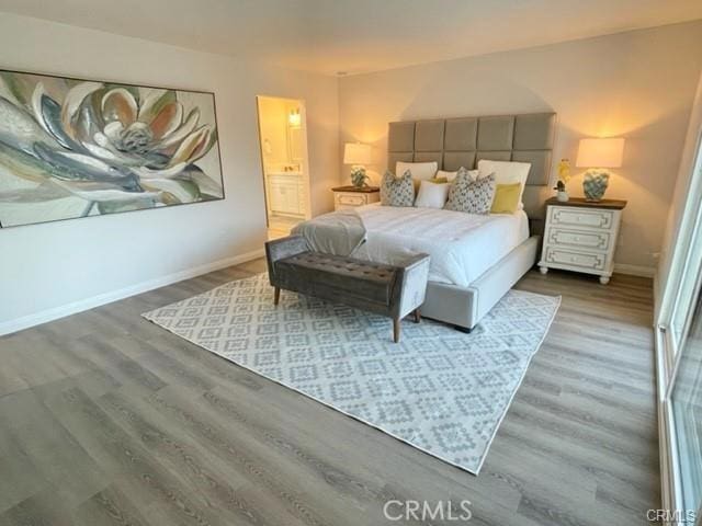 16413 Abascal Dr, Hacienda Heights, CA 91745 - bedroom featuring wood finished floors and connected bathroom