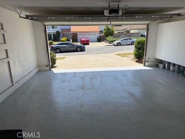 16413 Abascal Dr, Hacienda Heights, CA 91745 - garage featuring a garage door opener