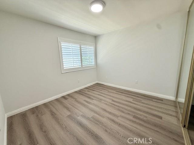 16413 Abascal Dr, Hacienda Heights, CA 91745 - empty room featuring wood finished floors and baseboards