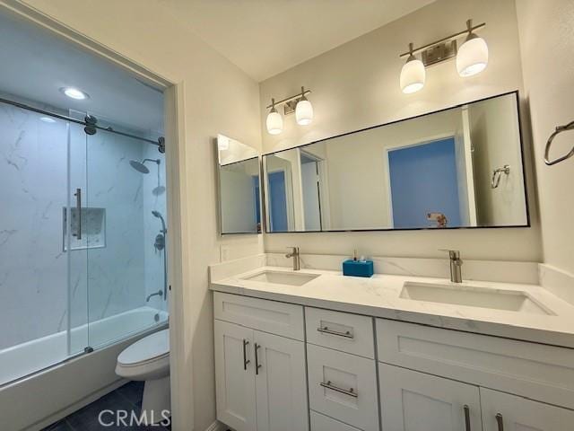 16413 Abascal Dr, Hacienda Heights, CA 91745 - bathroom with double vanity and shower / bath combination with glass door