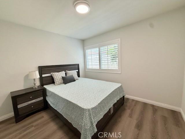 16413 Abascal Dr, Hacienda Heights, CA 91745 - bedroom with wood finished floors and baseboards