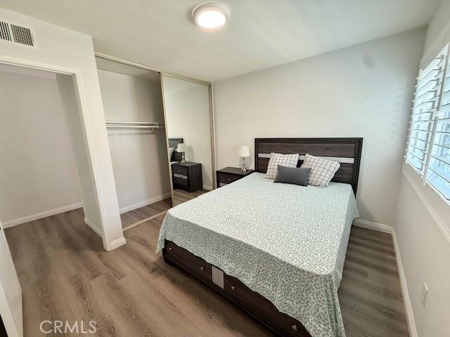 16413 Abascal Dr, Hacienda Heights, CA 91745 - bedroom with wood finished floors and a closet