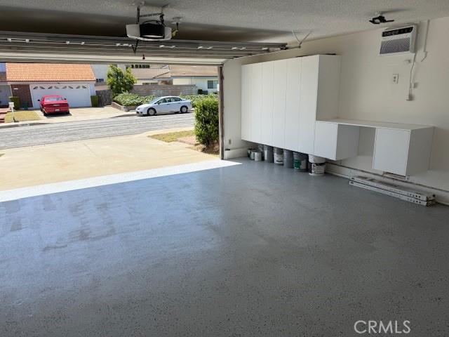 16413 Abascal Dr, Hacienda Heights, CA 91745 - garage with a garage door opener