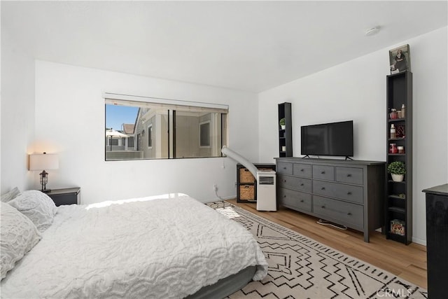 27074 Hidaway Ave Unit 3, Canyon Country, CA 91351 - bedroom with wood finished floors