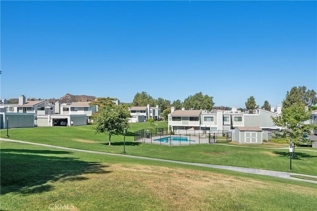 27074 Hidaway Ave Unit 3, Canyon Country, CA 91351 - view of community featuring a storage shed and a residential view