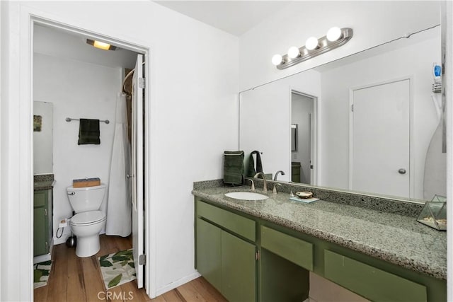27074 Hidaway Ave Unit 3, Canyon Country, CA 91351 - bathroom with vanity, wood finished floors, and a shower with curtain