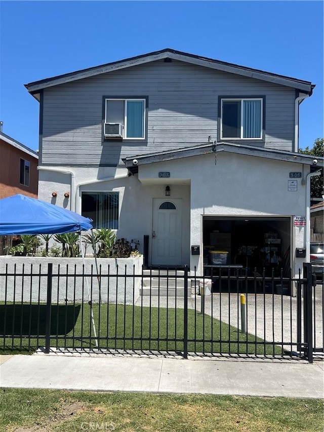 505 E 68th St, Los Angeles, CA 90003 - view of front of home with a garage, a fenced front yard, stucco siding, and cooling unit