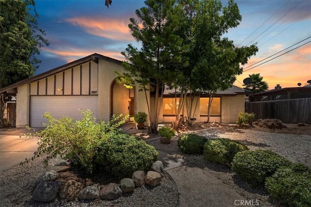 1897 Taylor Ave, Corona, CA 92882 - view of front of home with a garage, driveway, and stucco siding