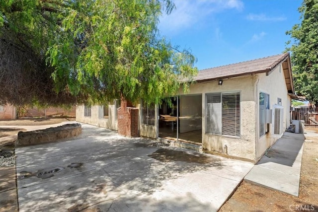 1897 Taylor Ave, Corona, CA 92882 - back of house featuring a patio and stucco siding