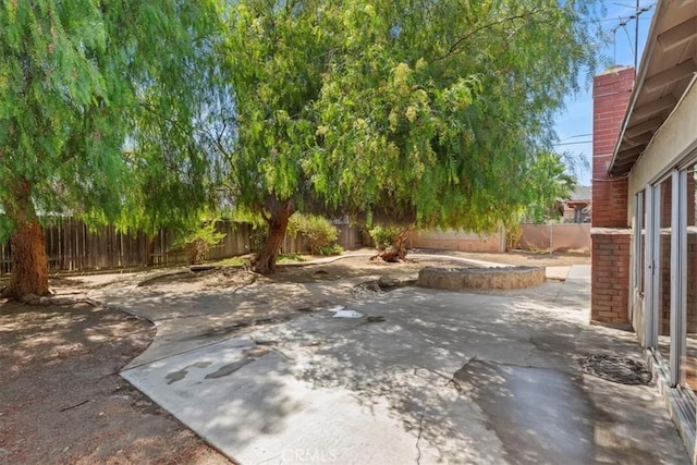 1897 Taylor Ave, Corona, CA 92882 - fenced backyard with a patio