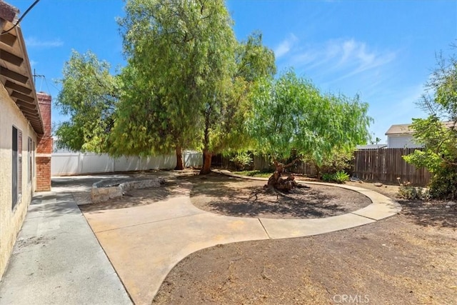 1897 Taylor Ave, Corona, CA 92882 - fenced backyard with a patio area