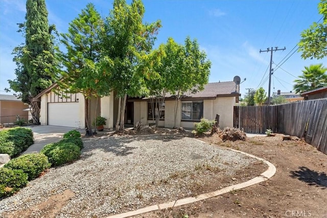 1897 Taylor Ave, Corona, CA 92882 - view of front facade with stucco siding, concrete driveway, and a garage