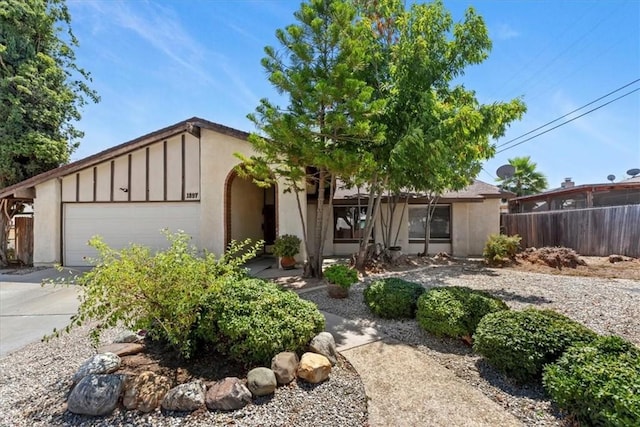 1897 Taylor Ave, Corona, CA 92882 - view of front facade featuring a garage, board and batten siding, concrete driveway, and stucco siding