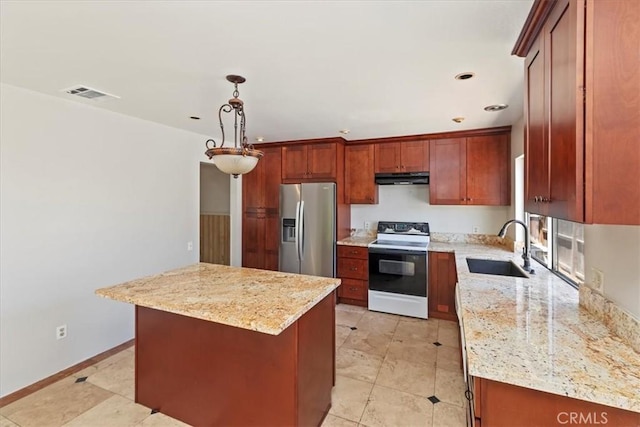 1897 Taylor Ave, Corona, CA 92882 - kitchen featuring stainless steel fridge with ice dispenser, electric range, under cabinet range hood, a kitchen island, and light stone counters