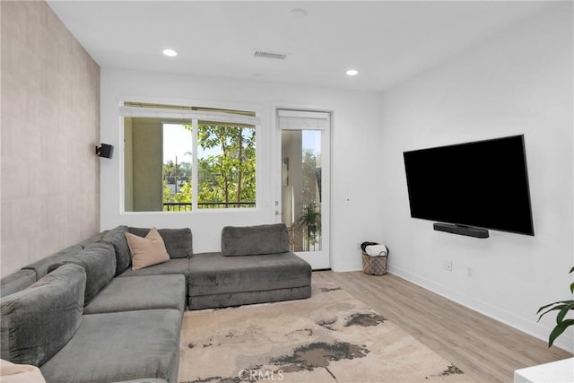 9958 Artesia Blvd Unit 1003, Bellflower, CA 90706 - living area with wood finished floors and recessed lighting