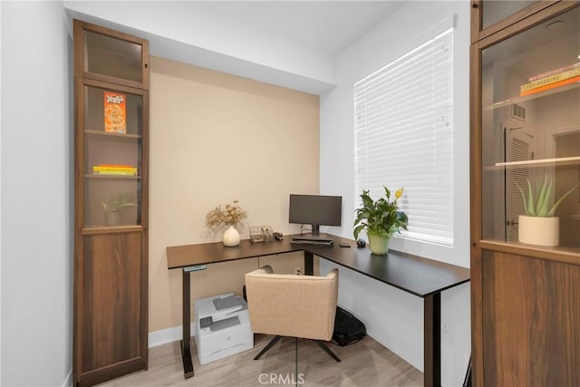9958 Artesia Blvd Unit 1003, Bellflower, CA 90706 - office area featuring wood finished floors and baseboards