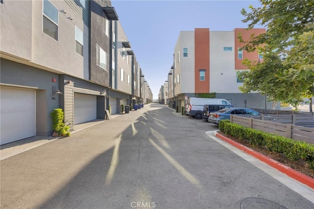 9958 Artesia Blvd Unit 1003, Bellflower, CA 90706 - view of asphalt road featuring a residential view