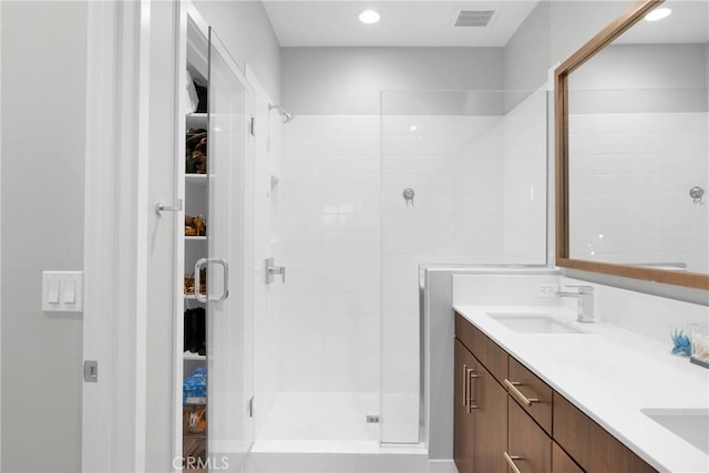 9958 Artesia Blvd Unit 1003, Bellflower, CA 90706 - bathroom featuring a stall shower and double vanity