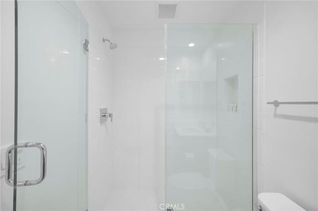 9958 Artesia Blvd Unit 1003, Bellflower, CA 90706 - bathroom with toilet and a shower stall