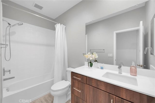 9958 Artesia Blvd Unit 1003, Bellflower, CA 90706 - full bath with vanity, shower / bath combo, and wood finished floors