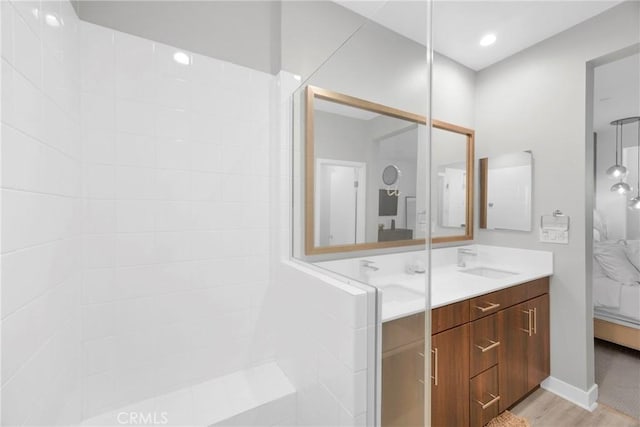 9958 Artesia Blvd Unit 1003, Bellflower, CA 90706 - full bath with double vanity, wood finished floors, and ensuite bathroom