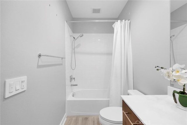 9958 Artesia Blvd Unit 1003, Bellflower, CA 90706 - bathroom featuring vanity, wood finished floors, and shower / tub combo with curtain