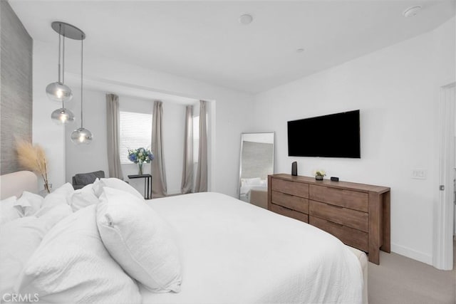 9958 Artesia Blvd Unit 1003, Bellflower, CA 90706 - bedroom featuring light colored carpet and baseboards