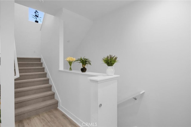 9958 Artesia Blvd Unit 1003, Bellflower, CA 90706 - stairs with wood finished floors