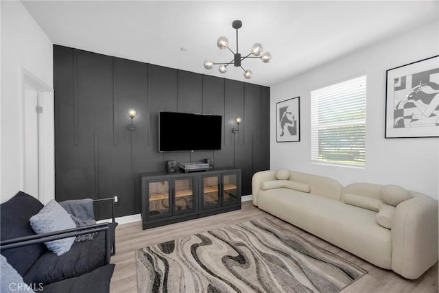 9958 Artesia Blvd Unit 1003, Bellflower, CA 90706 - living room with a chandelier and light wood-style floors