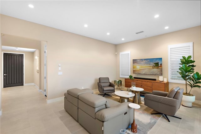 103 Winnett, Irvine, CA 92602 - living room with recessed lighting and light tile patterned floors