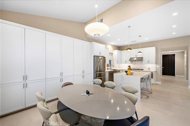 103 Winnett, Irvine, CA 92602 - dining area with recessed lighting and light tile patterned floors