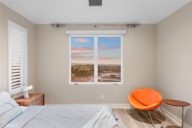 103 Winnett, Irvine, CA 92602 - bedroom featuring wood finished floors and baseboards