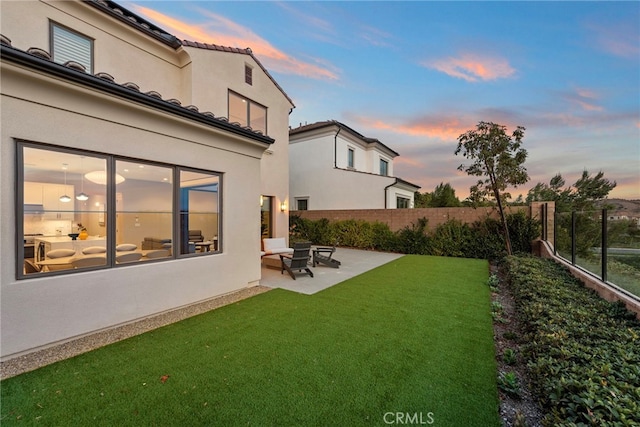 103 Winnett, Irvine, CA 92602 - yard at dusk with a patio