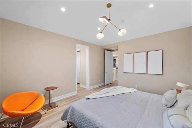 103 Winnett, Irvine, CA 92602 - bedroom with light wood-style flooring and recessed lighting