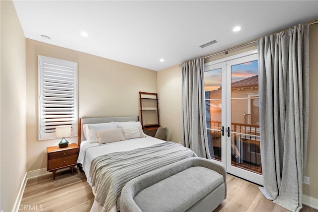103 Winnett, Irvine, CA 92602 - bedroom with french doors, access to outside, light wood-type flooring, and recessed lighting