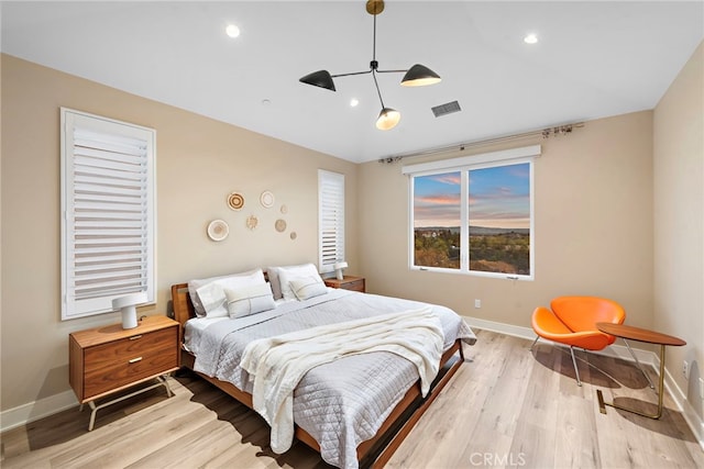 103 Winnett, Irvine, CA 92602 - bedroom with wood finished floors, recessed lighting, and vaulted ceiling