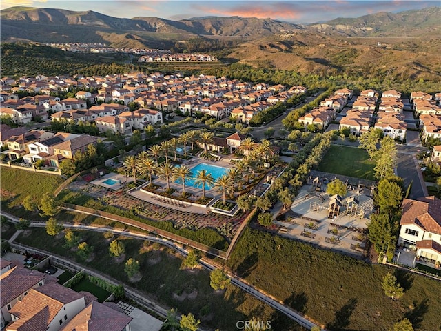 103 Winnett, Irvine, CA 92602 - aerial view of property and surrounding area with nearby suburban area and a mountain backdrop
